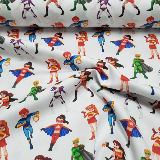Cotton Superheroes fabric - Satin cotton fabric with drawings of superheroes and superheroines on a white background. The fabric is 140cm wide and its composition is 100% cotton.