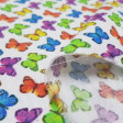 Cotton Butterflies Small Colors fabric - Satin cotton fabric with drawings of colorful butterflies on a white background. The fabric is 140cm wide and its composition is 100% cotton.