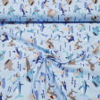 Cotton Funny Sharks fabric - Children's cotton fabric with drawings of sharks and other fishes on a light blue background decorated with small waves. The fabric is 140cm wide and its composition is 100% cotton.