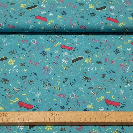 Cotton Skate Blue Petrol fabric - Cotton fabric with skate-themed drawings and other elements such as cassette tapes, rays, helmets, musical notes... contrasting colors on a petrol blue background. The fabric is 150cm wide and its composition is 100%