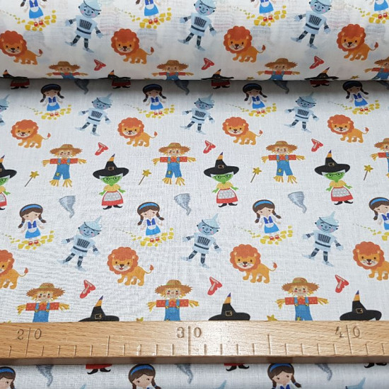 Cotton Wizard of Oz Tales fabric - Cotton fabric digital printing with drawings of the characters from the Wizard of Oz tale. The fabric is 140cm wide and its composition is 100% cotton.