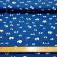 Cotton Eyes Looking Blue fabric - Cotton fabric with drawings of peeping eyes on a blue background. The fabric is 150cm wide and its composition is 100% cotton.
