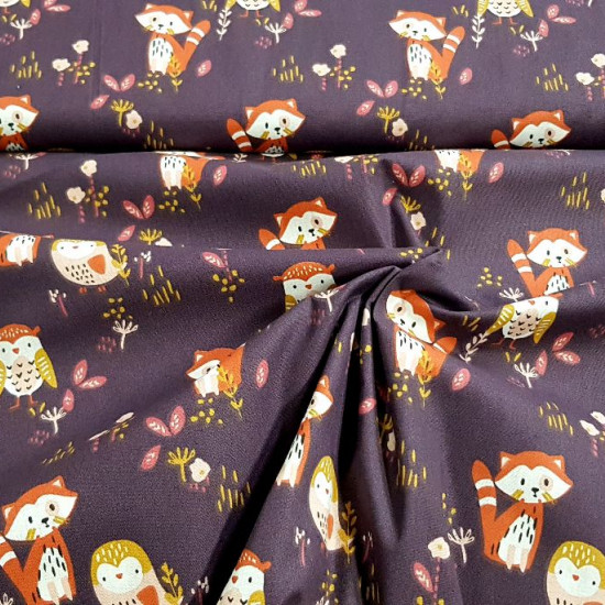 Cotton Foxes Birds Violet fabric - Children's cotton fabric with drawings of birds, owls and foxes on a dark purple background in contrast to ocher, orange, pink... The fabric is 150cm wide and its composition is 100% cotton.