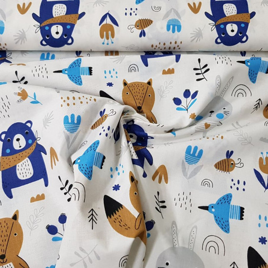Tela Algodón Animales del Bosque Azul - Tela de algodón de temática infantil con dibujos decorativos de animales del bosque como osos, conejos, zorros, abejas… donde predominan los colores azules. La tela mide 160cm de ancho