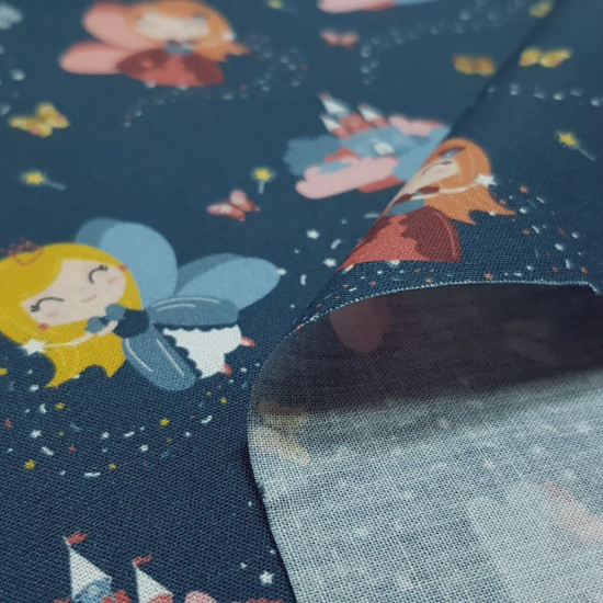 Cotton Fairy Princesses Fabby fabric - Organic cotton fabric (GOTS) with drawings of fairy princesses with magic wands on a dark blue background with butterflies and castles. The fabric is 150cm wide and its composition is 100% cotton.
