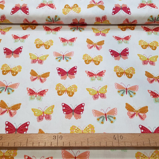 Tela Algodón Mariposas Multicolor - Tela de popelín algodón con dibujos de mariposas de colores sobre dos fondos de color a elegir. La tela mide 150cm de ancho y su composición 100% algodón.