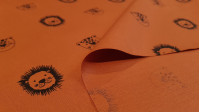 Cotton Animals Heads fabric - Organic cotton poplin fabric with drawings of animal heads on a rust-colored background. The fabric is 150cm wide and its composition is 100% cotton.