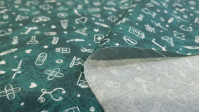 Cotton Medicine DNA fabric - Cotton fabric with medicine-themed drawings, with utensils and objects such as syringes, thermometers, plasters, stretchers, ambulances... on a petrol blue marbled effect background. The fabric is 150cm wide and its