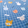 Cotton Animals Grids fabric - Poplin cotton fabric with a children's theme with drawings of animals on a background forming grids in various backgrounds to choose from. There are puppies, kittens and bunnies. The fabric is 150cm wide and its