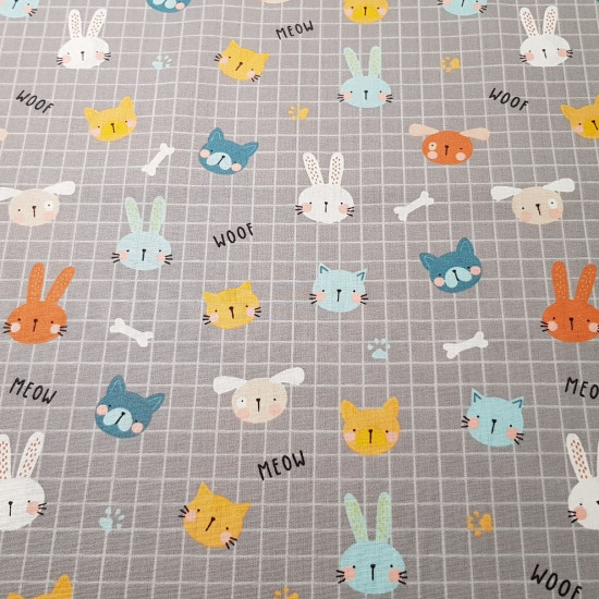 Cotton Animals Grids fabric - Poplin cotton fabric with a children's theme with drawings of animals on a background forming grids in various backgrounds to choose from. There are puppies, kittens and bunnies. The fabric is 150cm wide and its