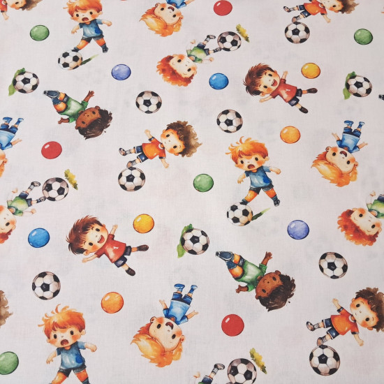 Cotton Playing Soccer fabric - Cotton poplin fabric with a children's theme featuring children playing soccer on a white background. The fabric is 150 cm wide and is made of 100% cotton.