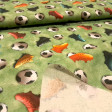 Cotton Soccer Balls 3D Effect fabric Cotton Soccer Balls 3D Effect fabric - 3D-effect cotton poplin fabric with soccer balls and multicolored sneakers on a mottled green background reminiscent of grass. The fabric is 150 cm wide and is made of 100% cotton.