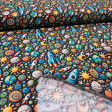 Cotton Rockets Space 3D Effect fabric Cotton Rockets Space 3D Effect fabric - Cotton poplin fabric with 3D clay-effect drawings of rockets, spaceships, planets, suns, and stars on a dark background. The fabric is 150cm wide and 100% cotton.