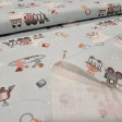 Cotton Trains Babies fabric - Cotton poplin fabric with drawings of toy trains, pacifiers, teethers, baby crib mobiles, babies... on a light colored background with white stars. The fabric measures 150cm wide and its composition is 100% cotton.