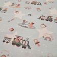 Cotton Trains Babies fabric - Cotton poplin fabric with drawings of toy trains, pacifiers, teethers, baby crib mobiles, babies... on a light colored background with white stars. The fabric measures 150cm wide and its composition is 100% cotton.