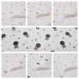 Cotton Skulls Little Stars Black fabric - Cotton poplin fabric with drawings of small skulls and stars in black and dark gray colors. The fabric is 150cm wide and its composition is 100% cotton.