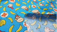 Tela Algodón Donkey Kong Plátanos - Tela de algodón licencia ancho americano con dibujos de los personajes monos del clásico videojuego Donkey Kong sobre un fondo de color azul con plátanos. La tela mide 110cm de ancho y su composición 100% algodón.