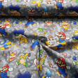 Tela Algodón Super Mario Villanos - Tela de algodón licencia ancho americano con dibujos de los personajes villanos del videojuego Super Mario, sobre un fondo de color gris. La tela mide 110cm de ancho y su composición 100% algodón.