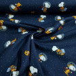 Cotton Snoopy Astronaut fabric - Licensed cotton poplin fabric with drawings of the character Snoopy in an astronaut suit on a dark blue background with little stars. The fabric is 140cm wide and its composition is 100% cotton.