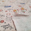 Cotton Tom Jerry Babies Spaceships fabric - Cotton poplin fabric with drawings of Tom and Jerry characters on spaceships on a background with planets and stars on a light pink background. The fabric is 150cm wide and its composition is 100% cotton.