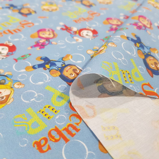 Cotton Paw Patrol Diving fabric - Licensed cotton fabric with drawings of the characters from the Paw Patrol series diving in the sea. The fabric measures between 140-150cm wide and its composition is 100% cotton.
