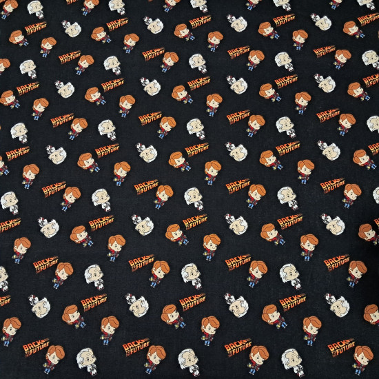 Cotton Back to the Future fabric - Patchwork poplin cotton fabric with drawings representing the characters Marty McFly and Doc from the long-awaited movie Back to the Future, and logos of the movie on a black background. The fabric measures 110cm wid