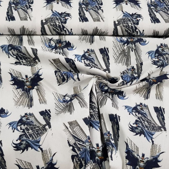 Cotton Batman City fabric - Cotton fabric of the superhero Batman in several shots running through the city on a white background. The fabric is 150cm wide and its composition is 100% cotton.