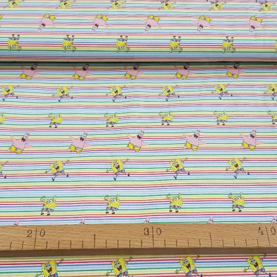 Cotton Sponge Bob Multi-stripes fabric - Cotton fabric with drawings of the cartoon character SpongeBob and Patrick Star on a background of fine multicolored stripes. The fabric is 150cm wide and its composition 100% cotton
