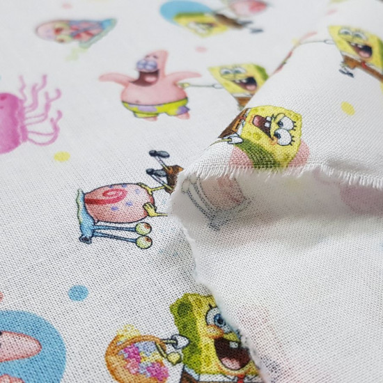 Cotton Spongebob Characters fabric - Licensed cotton fabric with drawings of SpongeBob characters on a white background with colorful polka dots. The fabric measures between 140-150cm wide and its composition is 100% cotton.