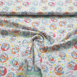 Cotton Doraemon fabric - Licensed cotton fabric with drawings of the character Doraemon making faces on a very colorful background with stars, bells and other shapes... The fabric measures between 140-150cm wide and its composition is 100% c