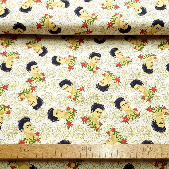 Cotton Frida Kahlo fabric - Licensed organic cotton fabric with Frida Kahlo drawings on a flowered background in light tones. The fabric is 150cm wide and its composition is 100% cotton.