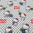 Cotton Hello Kitty Tennis Dots fabric - Beautiful licensed cotton fabric with drawings of Hello Kitty the cat with tennis rackets on a white background with black polka dots. The fabric is 150cm wide and its composition is 100% cotton.