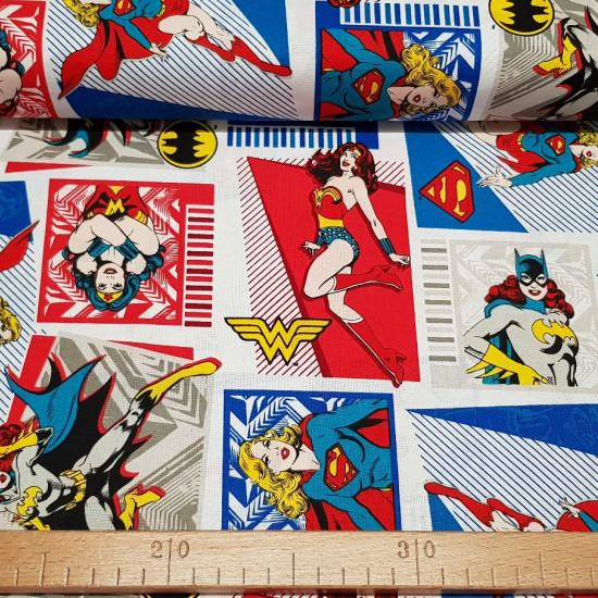 Cotton Heroines DC Comic fabric - License cotton fabric with comic cartoon style drawings with DC Comics superheroines (Wonder Woman, Supergirl, Catwoman) The fabric is 110cm wide and its composition is 100% cotton.