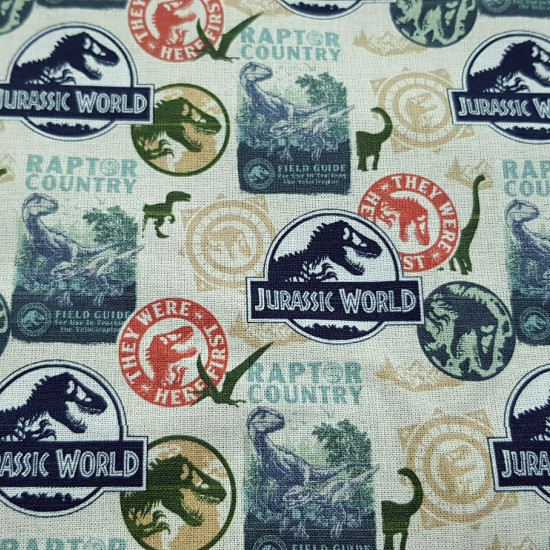 Cotton Jurassic World fabric - Licensed cotton fabric with drawings of Jurassic World posters and logos. The fabric measures 150cm wide and its composition is 100% cotton.