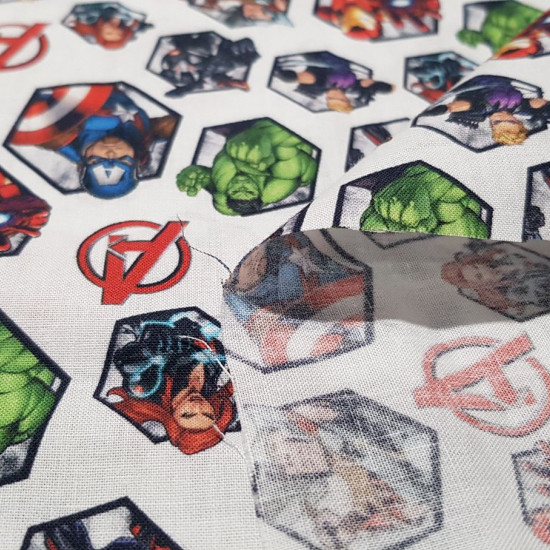 Cotton Marvel Avengers Icons fabric - Marvel licensed cotton fabric with drawings of icons of the characters and logos of The Avengers on a white background. The fabric measures between 140-150cm wide and its composition is 100% cotton.