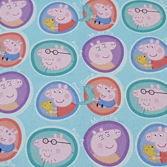 Tela Algodón Peppa Pig Personajes - Tela de algodón licencia con dibujos de los personajes Peppa, Mama Pig, Papa Pig y George en círculos sobre un fondo de color azul. La tela mide entre 140-150cm de ancho y su composición 100% algodón.