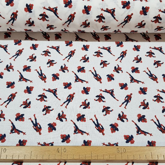Cotton Marvel Spiderman Poses Arachnids fabric - Licensed cotton fabric with drawings of the Spiderman character in various arachnid poses on a white background. The fabric is 150cm wide and its composition is 100% cotton.