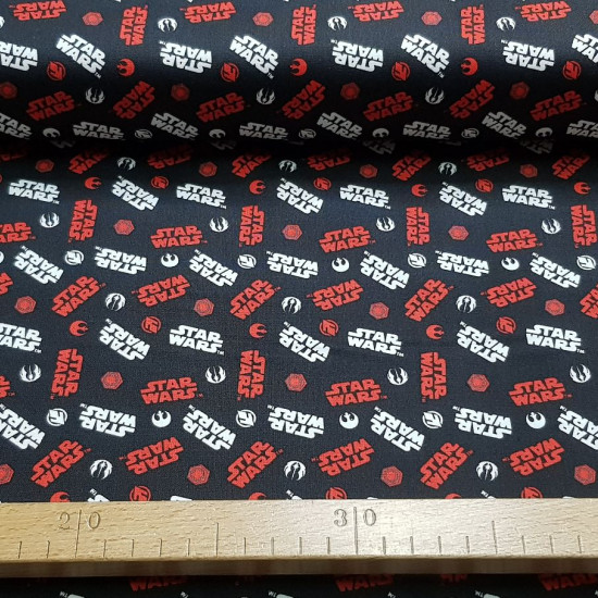 Cotton Star Wars Logos Red White fabric - Licensed cotton fabric with Star Wars logos in white and red colors on a black background. The fabric is 110cm wide and its composition is 100% cotton.