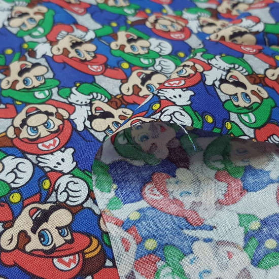Cotton Super Mario Luigi Mosaic fabric - Licensed cotton fabric with drawings of the characters Mario and Luigi from the video game Super Mario forming a mosaic. The fabric is 110cm wide and its composition is 100% cotton.