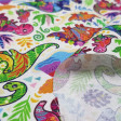 Tela Algodón Dinosaurios Coloridos Floral - Tela de algodón impresión digital con dibujos de dinosaurios de colores y texturas coloridas sobre un fondo blanco con flores tropicales y volcanes. Una tela preciosa! La tela mide 150cm de ancho y su composició