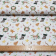 Cotton Christmas Gingerbread Cookies fabric - Christmas-themed cotton fabric featuring drawings of gingerbread cookies, stars, socks and more Christmas ornaments on a white background. The fabric is 150cm wide and its composition 100% cotton