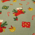 Cotton Christmas Socks Rattlesnake fabric - Christmas cotton poplin fabric with drawings of Christmas socks, bells, gifts, candy canes... on a white or light green background. A very representative fabric of Christmas. The fabric is 148cm wide and its com