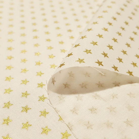 Cotton Christmas Golden Stars fabric - Christmas cotton fabric with drawings of golden stars on various backgrounds to choose from. A fabric that can be combined with other colors and create a warm atmosphere for Christmas. The composition of the fabric i