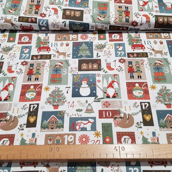 Tela Algodón Navidad Calendario Adviento - Tela de popelín algodón orgánico de temática navideña con dibujos del calendario de adviento con dibujos en cada día del mes. Es una tela muy original y bonita. La composición de la tela es 100% algodó