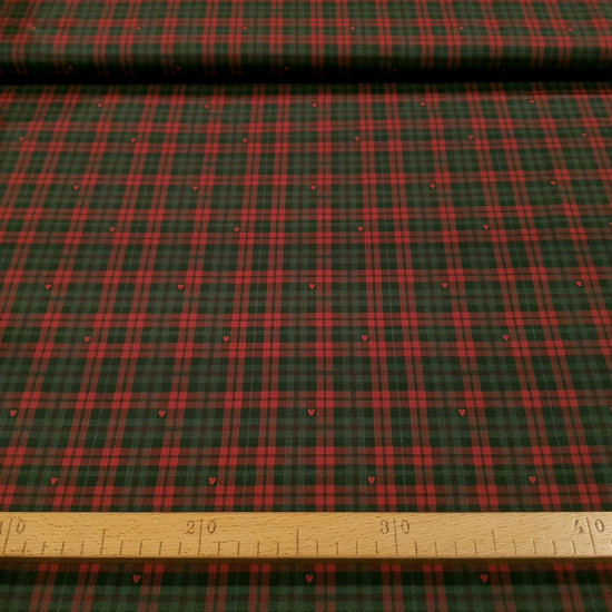 Cotton Scottish Check Jackson fabric - Organic cotton poplin fabric with a Scottish check pattern with small red hearts. The fabric measures 145cm wide and its composition is 100% cotton.