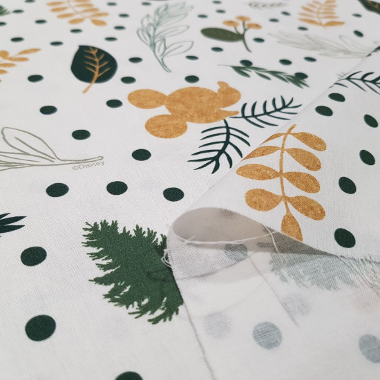 Cotton Disney Christmas Branches Silhouettes Mickey fabric - Precious Disney licensed cotton poplin fabric with Christmas drawings of Mickey silhouettes, tree branches, dots... where green and gold colors predominate, on a white background. The fabric is 