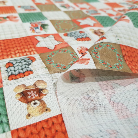 Algodón Navidad Patchwork Kenai - Tela de popelín algodón orgánico con dibujos de adornos de navidad y otras texturas en varios tonos formando una preciosa combinación de patchwork. La tela mide 150cm de ancho y su composi