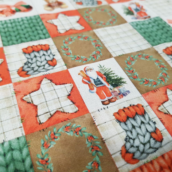 Algodón Navidad Patchwork Kenai - Tela de popelín algodón orgánico con dibujos de adornos de navidad y otras texturas en varios tonos formando una preciosa combinación de patchwork. La tela mide 150cm de ancho y su composi