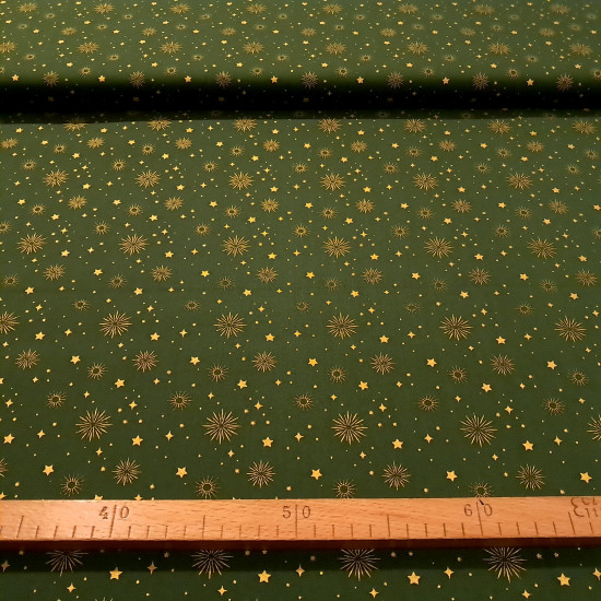 Algodón Navidad Estrellas Doradas Golden - Tela de popelín algodón con dibujos de estrellas y destellos dorados sobre tres fondos de color a elegir. Esta tela es ideal para tus proyectos de Patchwork navideños! La tela mide 150cm de ancho