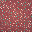 Cotton Christmas Stars Wishes fabric - Cotton poplin fabric with Christmas star designs in different shapes and colors on a red/maroon background. The fabric is 150 cm wide and is made of 100% cotton.
